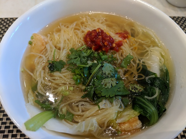 A bowl of spicy noodle soup.